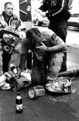 A hero firefighter gets some oxygen