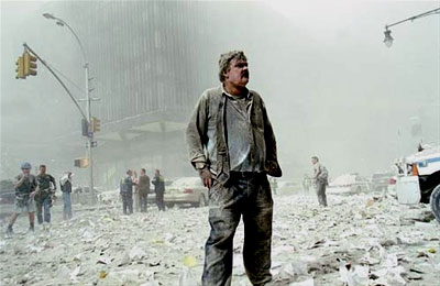 Covered with Ash: A survivor stands amid the debris of Ground Zero