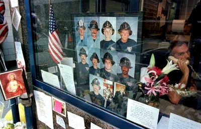 Fallen Heroes: Pictures of hero firefighers who died on 911 are displayed with honor at their fire station